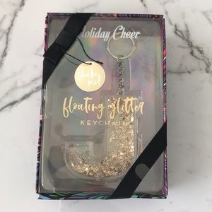 J key chain floating glitter new in box gold